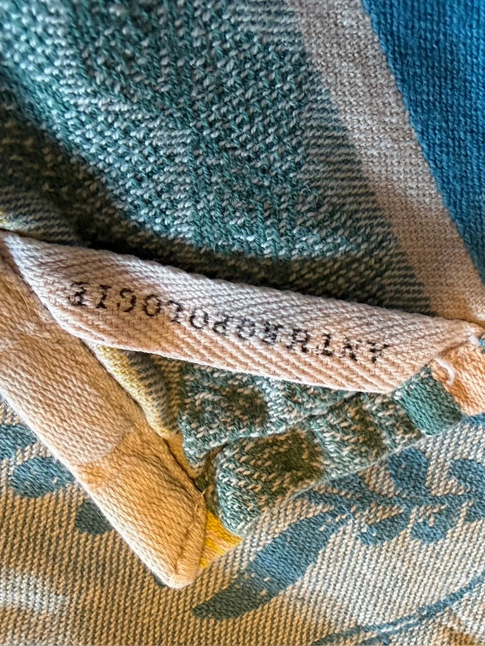 Pair of Anthropologie kitchen towels - purple good condition- blue has bleaching